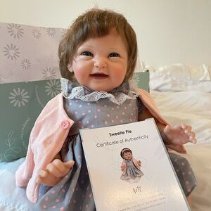 Paradise Galleries: Sweetie Pie Baby Doll with Gray/Pink Polka Dot Dress